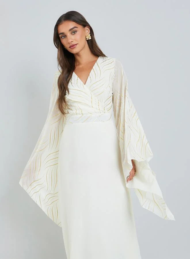 ستايلي فستان طويل بأكمام جرس وتصميم مريح